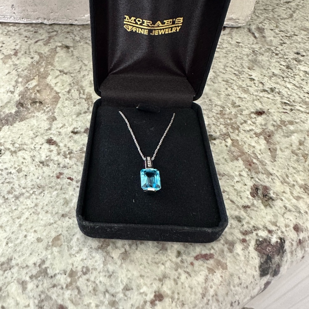 NWOT;10k White Gold Emerald Cut Blue Topaz and Diamond Accented Bail Pendant;3K